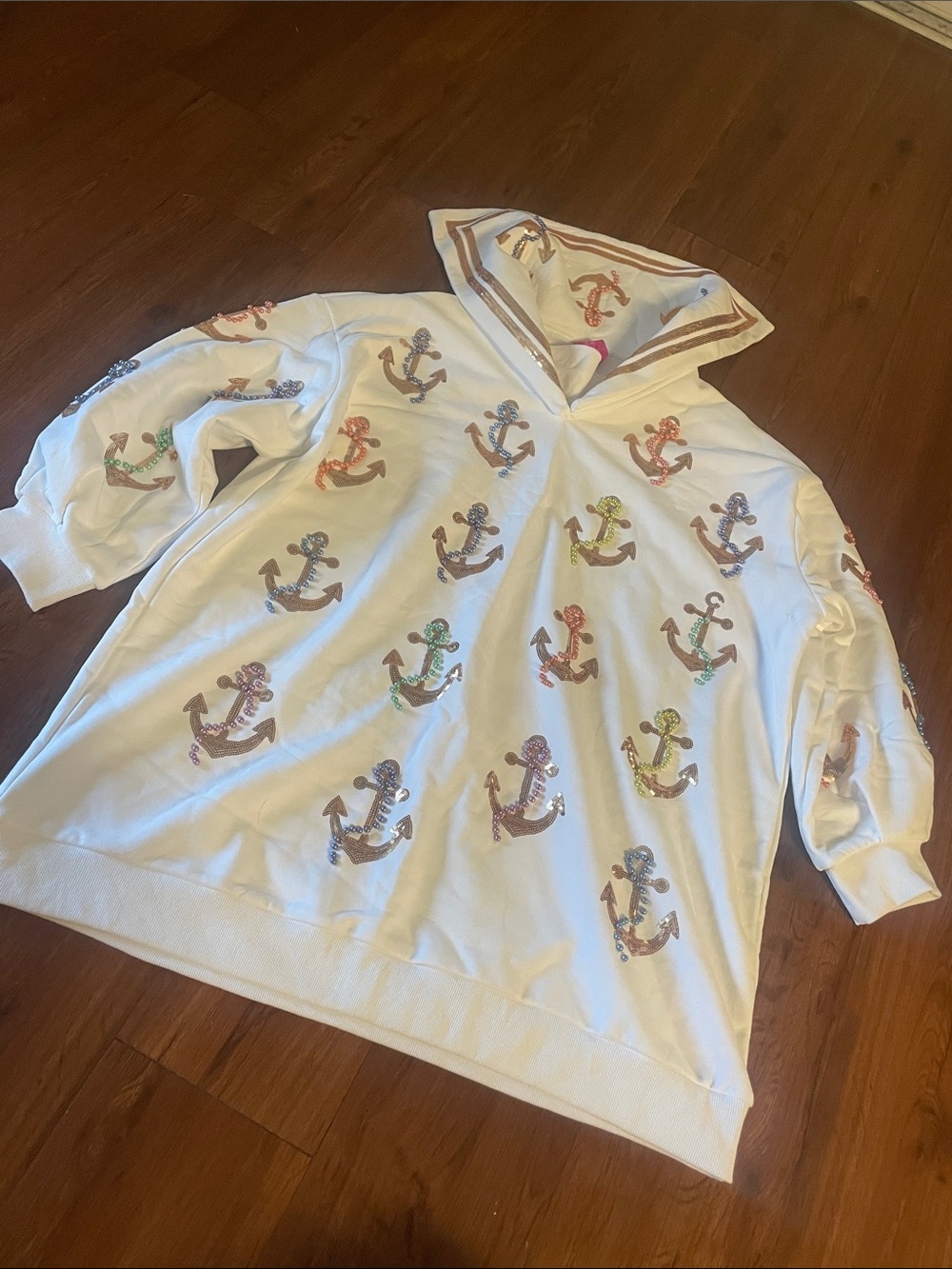 QUEEN OF SPARKLES White Hooded Mini Dress with Multicolor Sequin Anchors